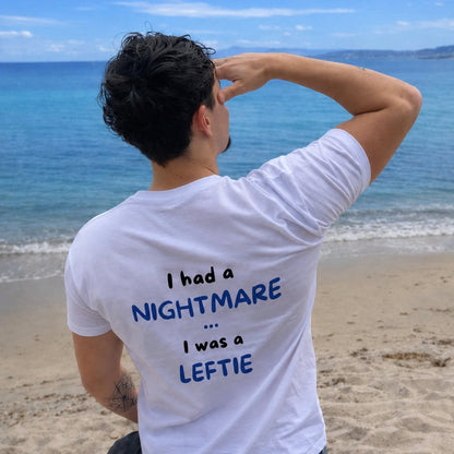 The Leftie t-shirt worn on the beach, back print readable