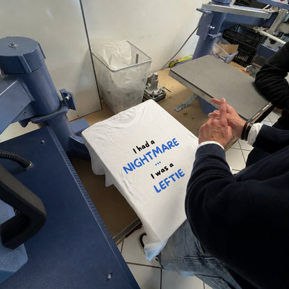 The Leftie t-shirt being printed on a press